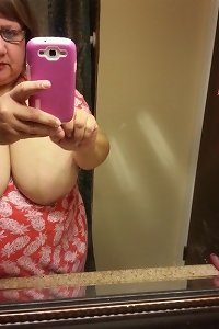 plump girl posing invitingly in lingerie